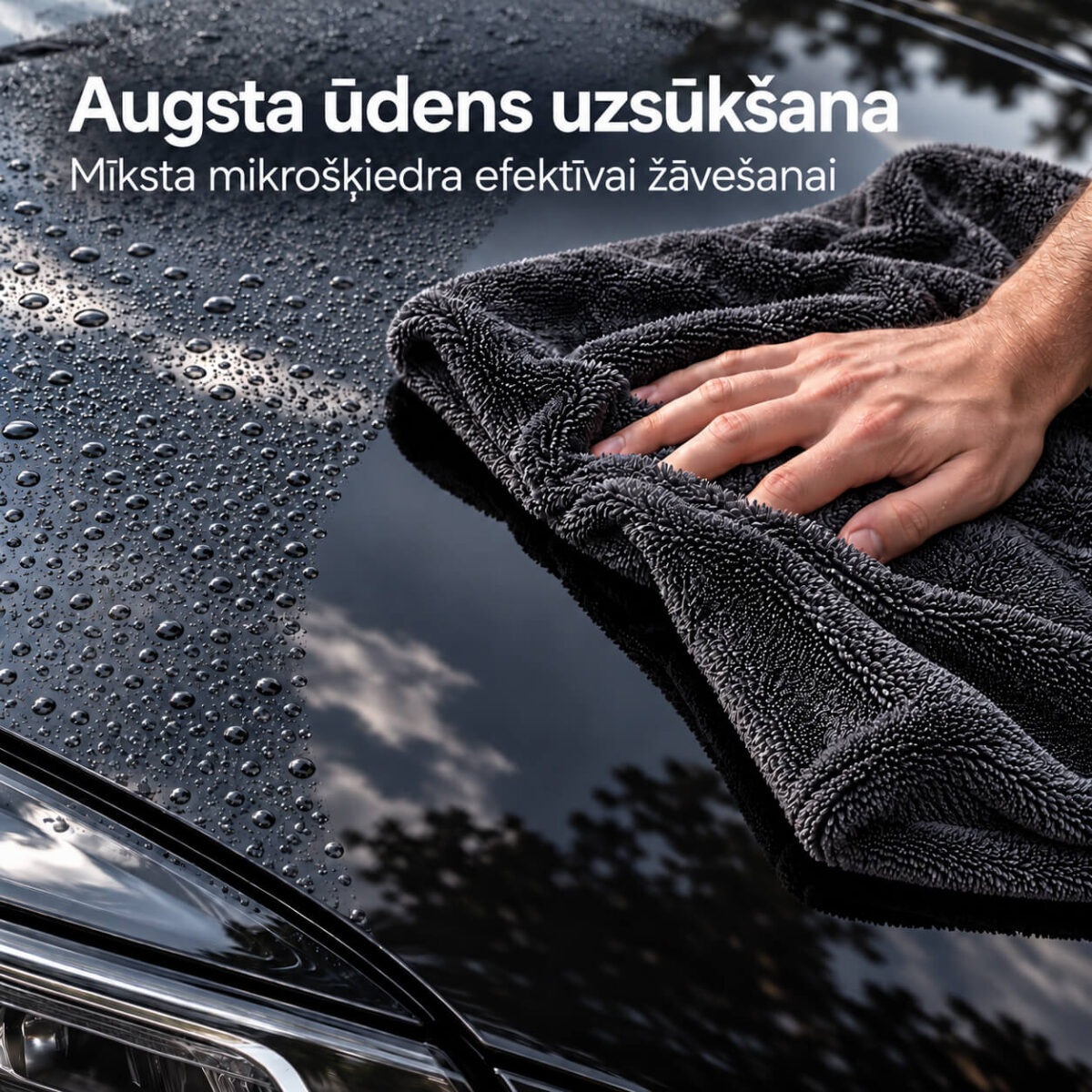 NANO GO XXL Microfiber Towel | High Water Absorption Hand using a dark grey NANO GO microfiber towel to dry water droplets from a black car bonnet